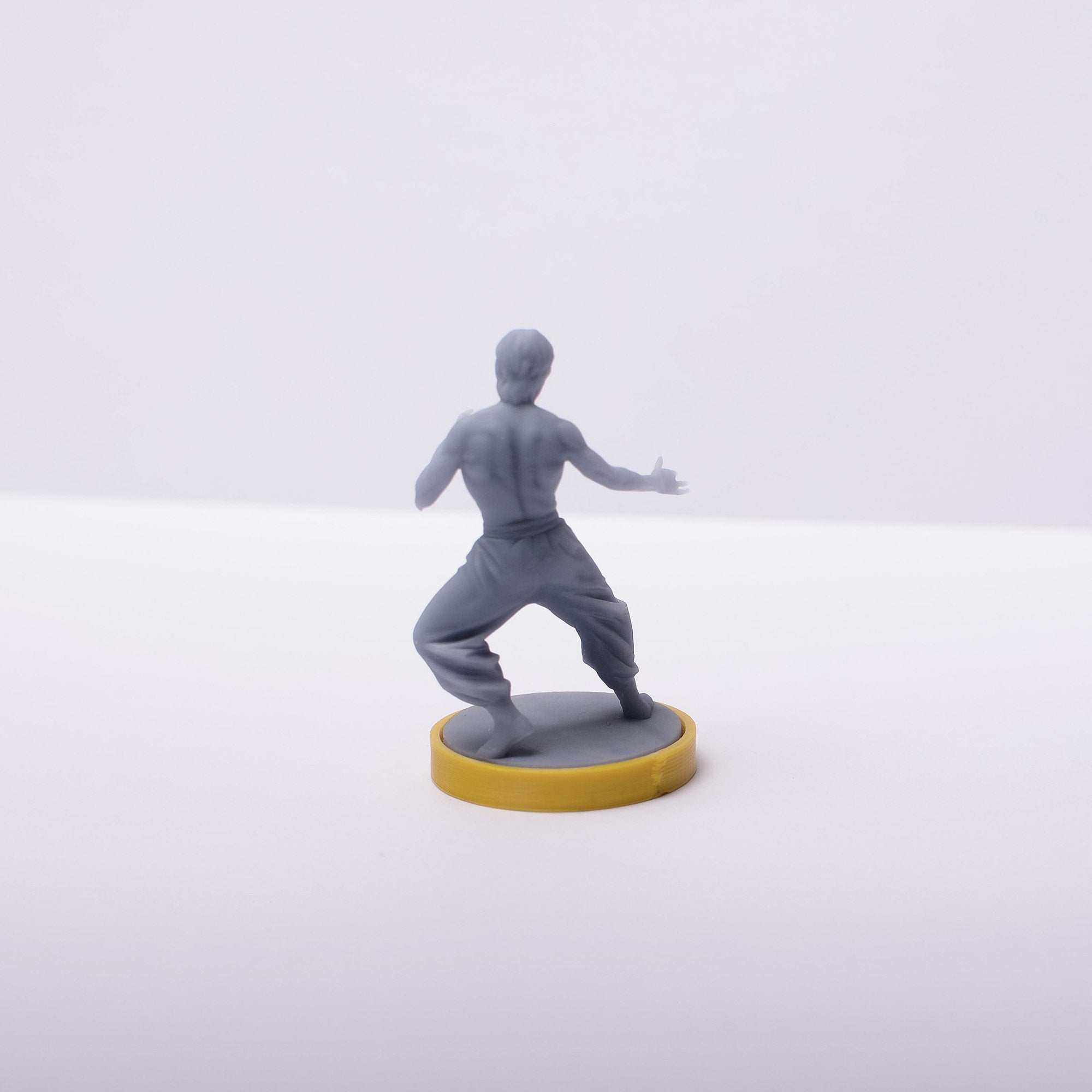 Bruce Lee Figure |  Meeple | Figurines | Unmached | Unmached Game | Unmached Miniatures | Unmached Bruce Lee - board game expansion set - BoardGeekFox